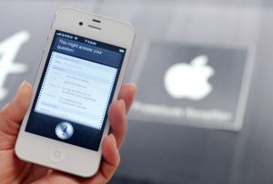 A woman displays "Siri", voice-activated