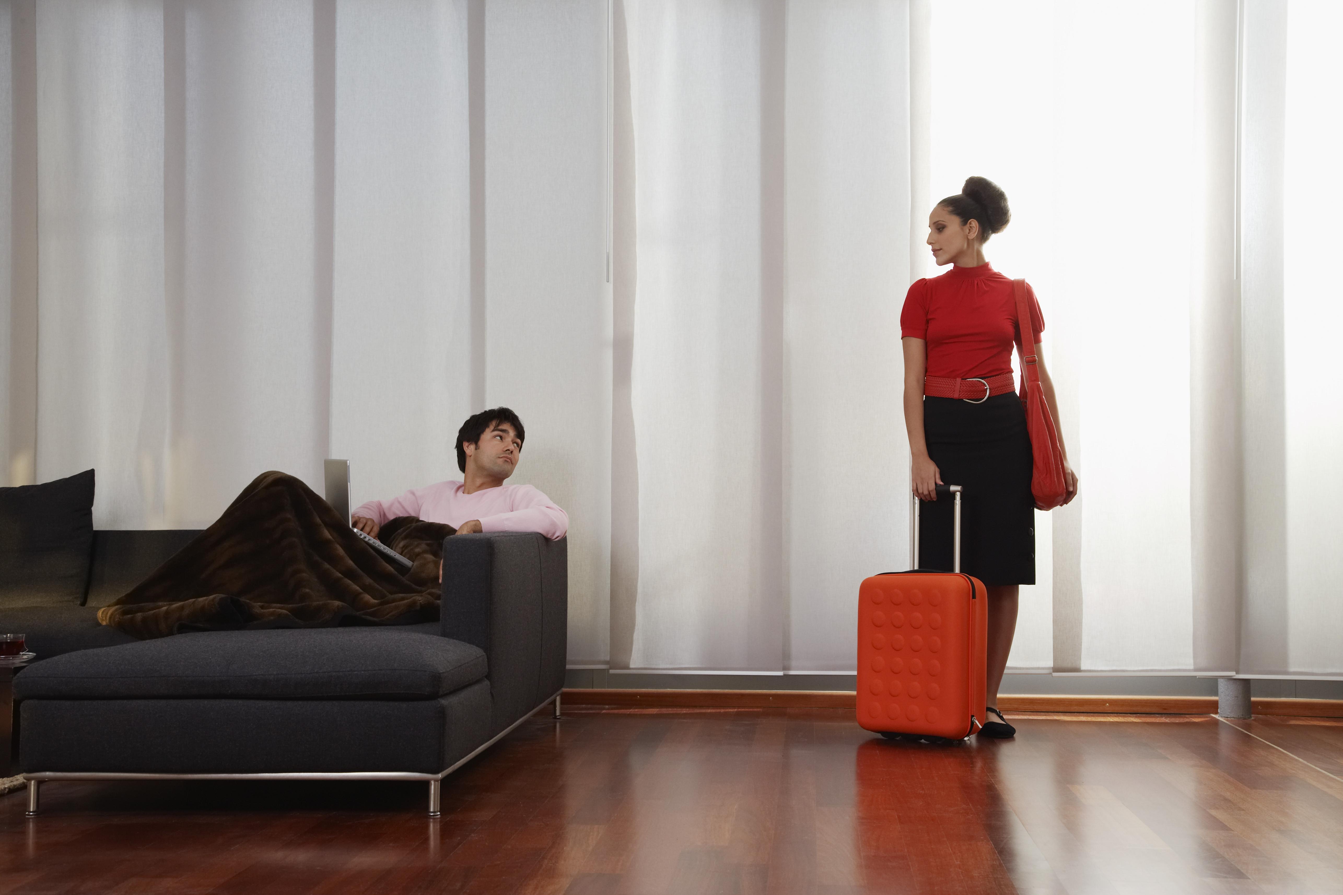 Young Woman Preparing to Leave Man